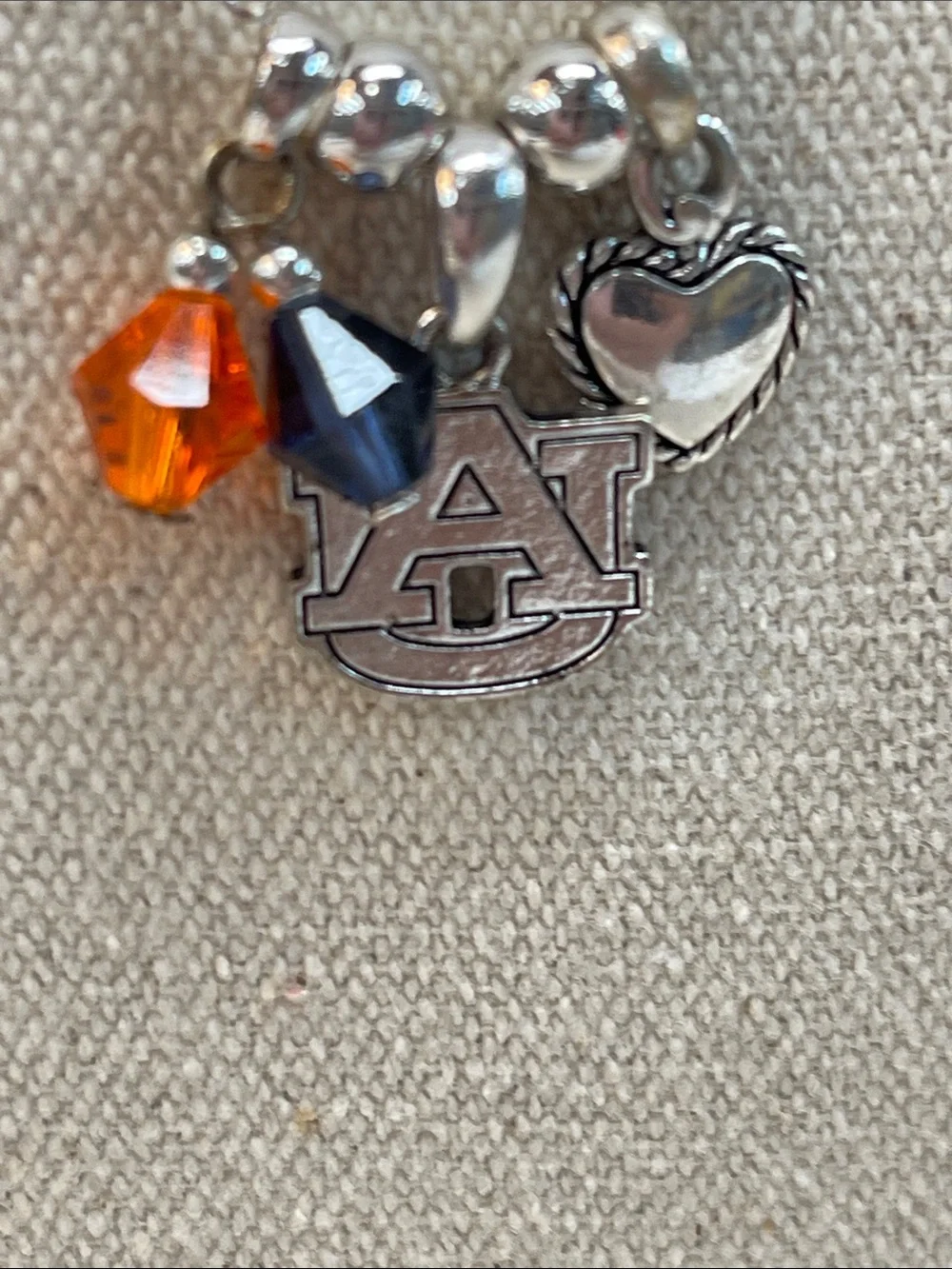 Auburn collegiate silver necklace with AU pendant in blue and orange